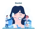 Dentist profession. Dentists in uniform treat tooth using