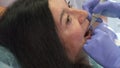 Dentist provides ultrasonic debridement for woman Royalty Free Stock Photo