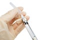Dentist`s hand with carpool syringe for local anesthesia on white background