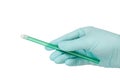 Dentist`s hand in glove with a saliva ejector