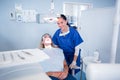 Dentist sitting over patient in the chair Royalty Free Stock Photo