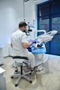 Dentist Surgeon Install Dental Implant Teeth