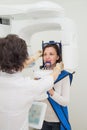 Dentist taking a panoramic digital X-ray of a patient s teeth Royalty Free Stock Photo