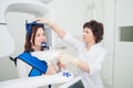 Dentist taking a panoramic digital X-ray of a patients teeth Royalty Free Stock Photo