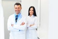 Dentist Team at Dental Clinic. Two Smiling Doctors at their Work Royalty Free Stock Photo