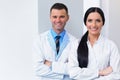 Dentist Team at Dental Clinic. Two Smiling Doctors at their Work