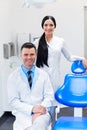 Dentist Team at Dental Clinic. Two Smiling Doctors at their Work Royalty Free Stock Photo