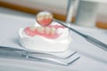 Dentist tools with acrylic denture (False teeth)