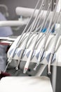 dentist tools and burnishers on a dentist chair in Dentist Clinic. Different dental instruments and tools