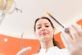 Dentist with tools Royalty Free Stock Photo