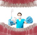 Dentist with tools. Concept of dentistry, whitening, oral hygiene, teeth cleaning with toothbrush, floss. Dentistry, taking care Royalty Free Stock Photo