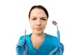 Dentist with tools. Concept of dentistry, whitening, oral hygiene, teeth cleaning with toothbrush, floss. Dentistry, taking care