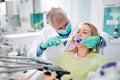 Dentist use dental light instrument for working