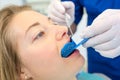 Dentist using mouth guard on woman Royalty Free Stock Photo