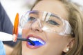 Dentist Using Ultraviolet Lamp Royalty Free Stock Photo