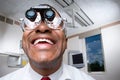 Dentist wearing dental binocular loupes