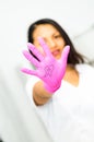 Dentist woman showing her hand with a tooth drawing