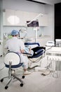 A dentist working in a dental clinic