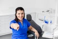 Female dentist or nurse at dental clinic office