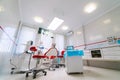 Dentistry, medicine, medical equipment and stomatology concept - interior of new modern dental clinic office with chair. Royalty Free Stock Photo