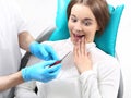 Dentistry, plucking, chiselling carious tooth Royalty Free Stock Photo