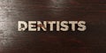 Dentists - grungy wooden headline on Maple - 3D rendered royalty free stock image