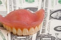 dentures on dollars Royalty Free Stock Photo