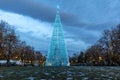 Artificial fir tree with colorful Christmas decorations LED strip light in the Denver Civic Center park