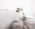 View from passenger window of de-icing of aircraft wing