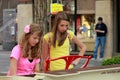 Two girls playing piano on 16th street in downtown Denver Royalty Free Stock Photo