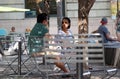 A couple talking in a small outdoor cafe near Union Station in downtown Denver, Colorado Royalty Free Stock Photo