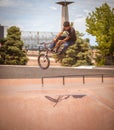 Denver Skate Park bmx and skateboarder