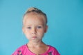 Denying, rejecting, disagree. Portrait of beautiful little girl. little girl on a brushed background