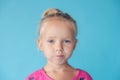 Denying, rejecting, disagree. Portrait of beautiful little girl. little girl on a brushed background