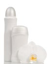 Deodorants and orchid flower Royalty Free Stock Photo