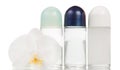 Deodorants and orchid flower Royalty Free Stock Photo