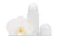 Deodorants and orchid flower Royalty Free Stock Photo