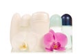 Deodorants and orchid flower Royalty Free Stock Photo