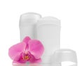 Deodorants and orchid flower Royalty Free Stock Photo