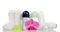Deodorants and orchid flower Royalty Free Stock Photo
