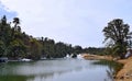 Deoria or Deoriya Tal Lake with Surrounding Trees and Snow - Winter Himalayan Landscape, Uttarakhand, India Royalty Free Stock Photo