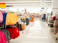 Department of clothing sales in supermarkets, Blurred shopping mall and retails store interior for background.