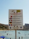 Department of public health notice sign in four languages