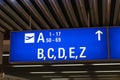 Departure gate and terminal sign in international airport Royalty Free Stock Photo