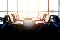 Departure lounge with empty chairs in the terminal of airport Royalty Free Stock Photo