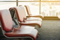 Departure lounge with empty chairs in the terminal of airport Royalty Free Stock Photo