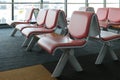 Departure lounge with empty chairs in the terminal of airport Royalty Free Stock Photo