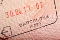 Departure stamp in a passport from Barcelona airport Royalty Free Stock Photo