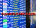 Departures board with cancelled sign due to coronavirus. Royalty Free Stock Photo