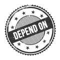DEPEND ON text written on black grungy round stamp